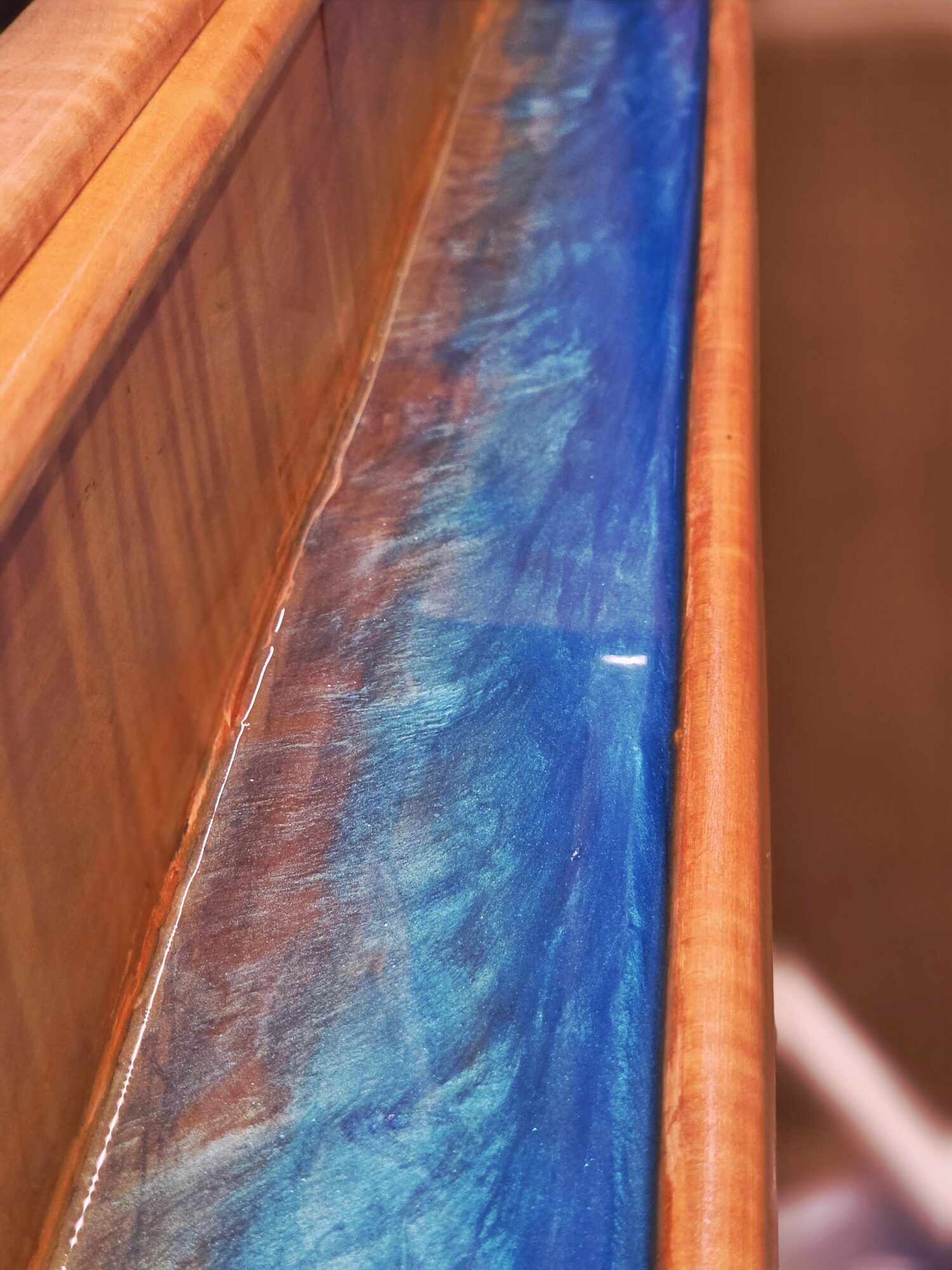 Live edge bar top with cobalt blue resin river