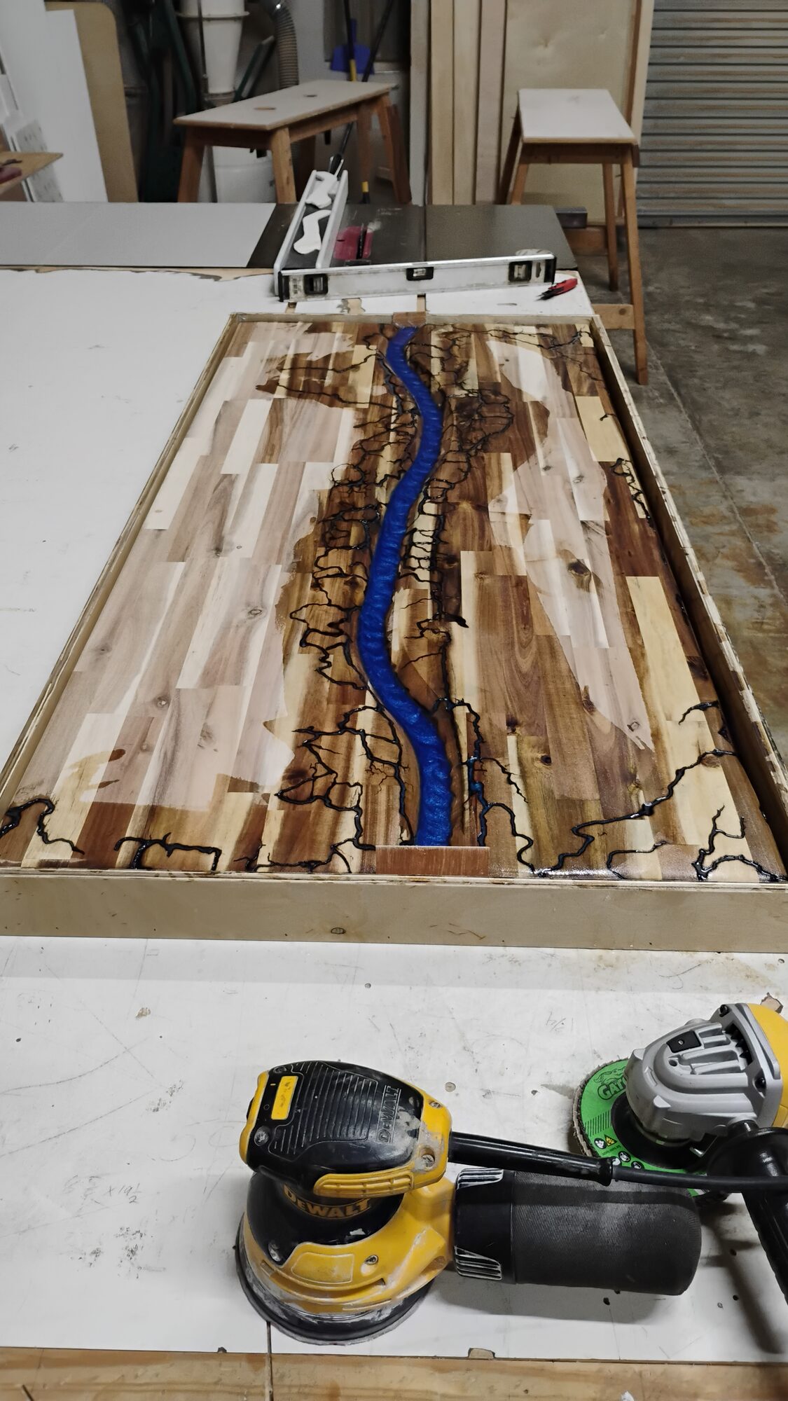 Blue resin poured into the channel