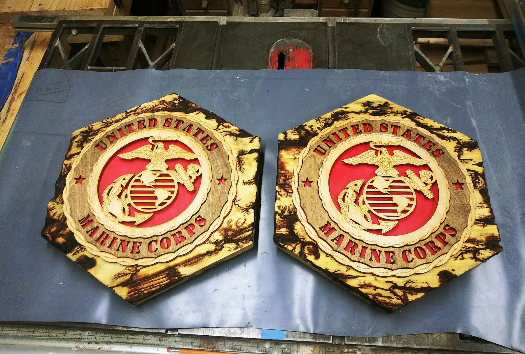 Two hexagonal tops with the emblem inlaid